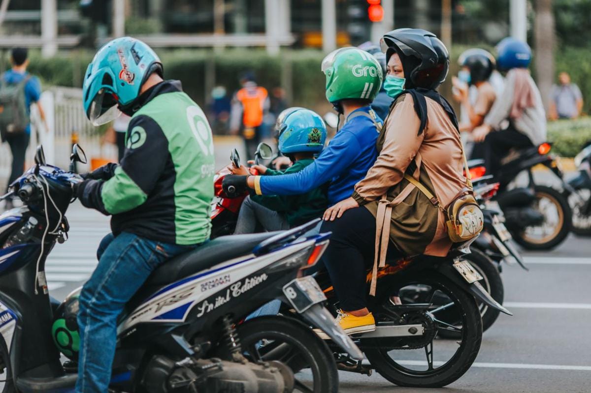 Bisakah Ojol Dilindungi Tanpa Mematikan Ekonomi Platform?
